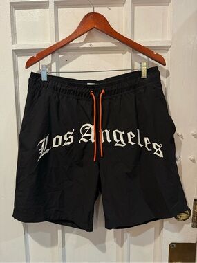 Primark Black Mesh Athletic Shorts with Small Orange Accent